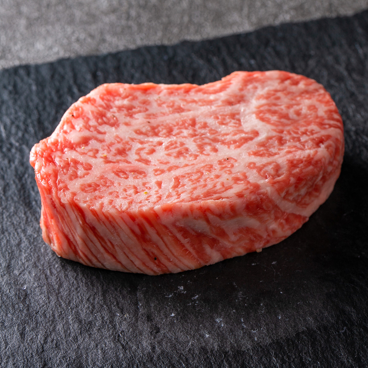This A5 Wagyu 6oz tenderloin filet is marbled beautifully and cuts like butter, it is from the Suekichi Genki Farm in Miyazaki, Japan. We hand select each loin prior to purchase to ensure that we offer nothing but the finest Wagyu on the Market.   A5 Wagyu beef from Miyazaki prefecture is among the finest and most luxurious brands of beef in the world. A highly sought-after selection of A5 Japanese Miyazaki Wagyu is Miyazakigyu, which is world-renowned for its intricate, snowflake-like marbling. 